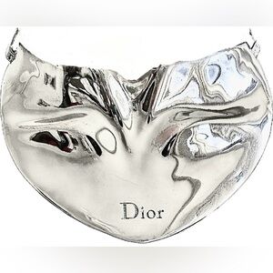 Dior collarbone neck piece by John Galliano for 2003.